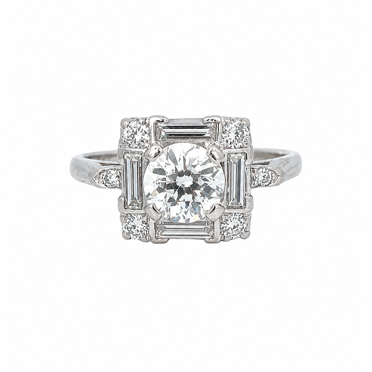 Vintage Platinum Round Brilliant Diamond Ring with Baguette Accents