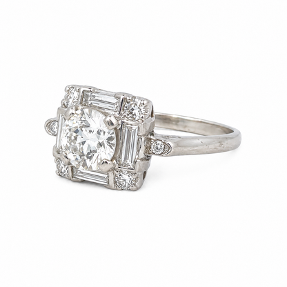 Vintage Platinum Round Brilliant Diamond Ring with Baguette Accents