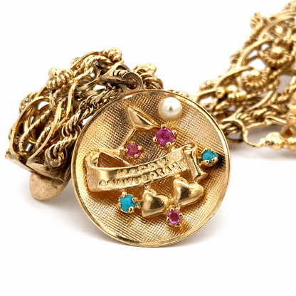 Vintage 14K Yellow Gold Story Charm Bracelet with Nine Gemstone & Pearl Charms