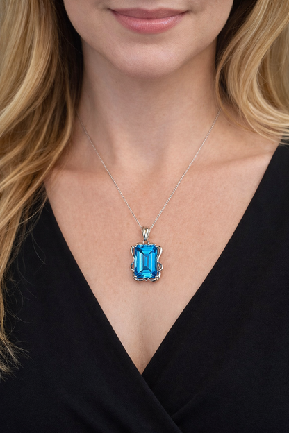 Large Emerald-Cut Blue Topaz Pendant in 14K White Gold