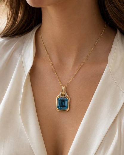 14K Yellow Gold Emerald Cut Blue Topaz & Diamond Enhancer Pendant