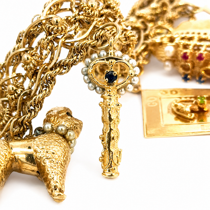 Vintage 14K Yellow Gold Story Charm Bracelet with Nine Gemstone & Pearl Charms