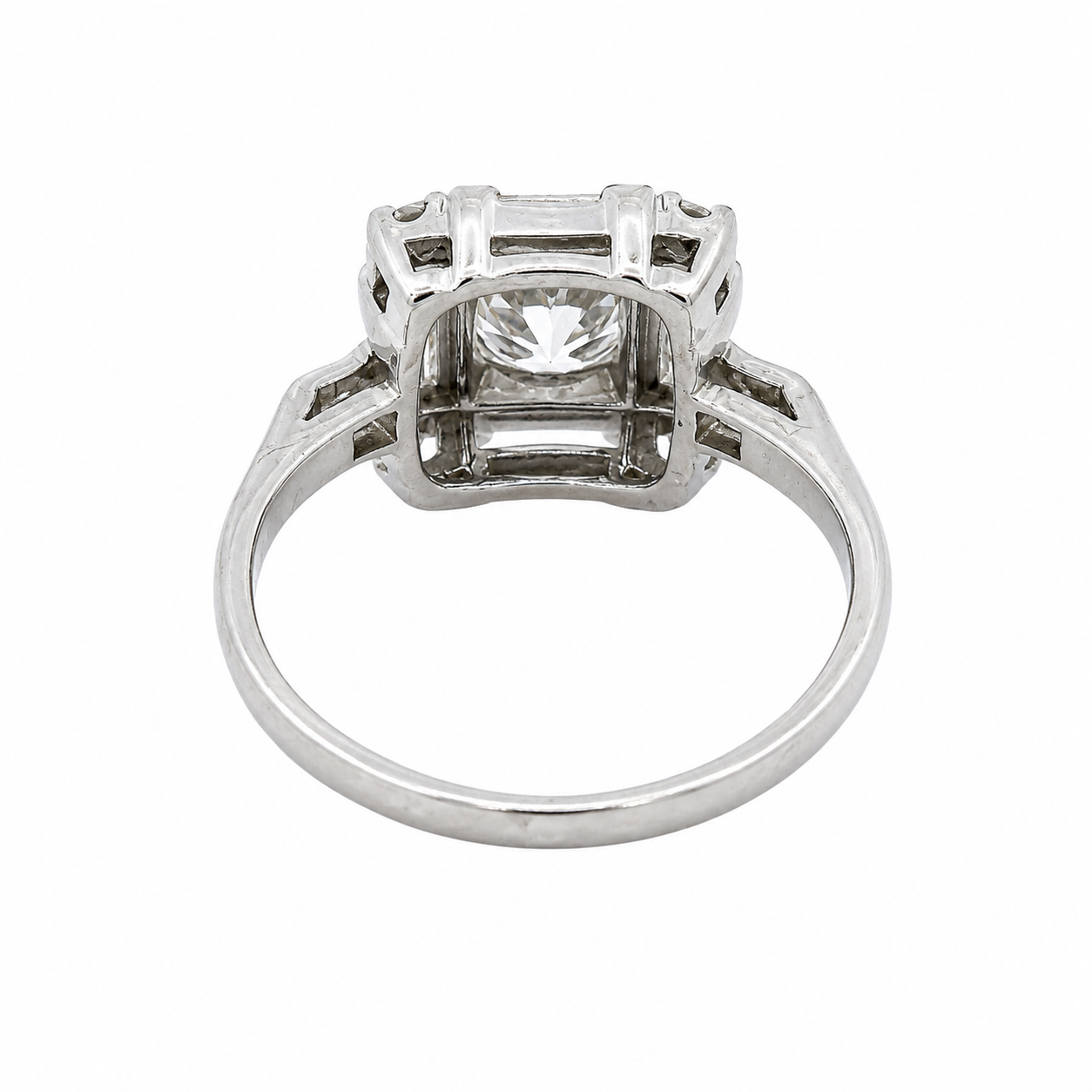 Vintage Platinum Round Brilliant Diamond Ring with Baguette Accents