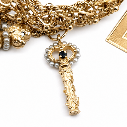 Vintage 14K Yellow Gold Story Charm Bracelet with Nine Gemstone & Pearl Charms