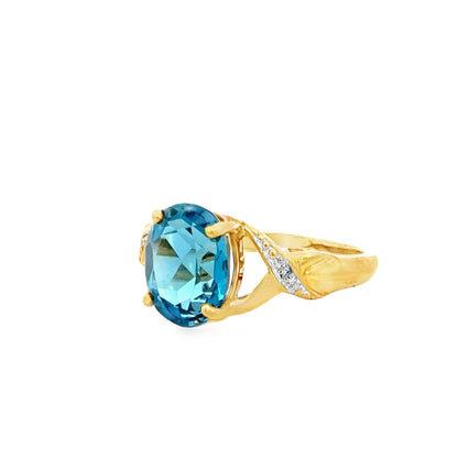 Yellow Gold Blue Oval Topaz & Diamond Ribbon Ring