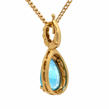 14K Gold Blue Topaz Pear Pendant with Diamond Accents Enhancer