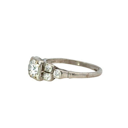 Elegant Antique Platinum Diamond Ring with Brilliant Cut Center
