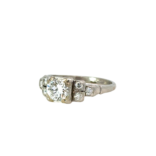 Elegant Antique Platinum Diamond Ring with Brilliant Cut Center