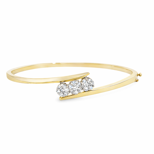 Classic 14K Yellow Gold Diamond Bangle with Triple Flower Design