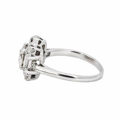 Vintage Platinum Round Brilliant Diamond Ring with Baguette Accents
