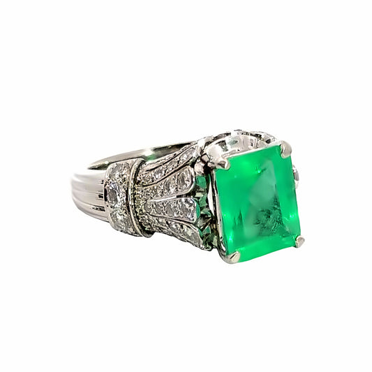Dazzling Platinum Diamond-Encrusted Emerald Ring