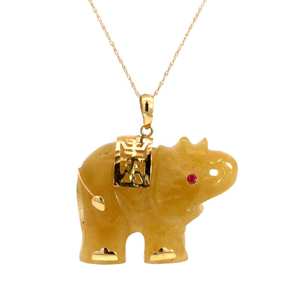 14K Yellow Gold Carved Yellow Jade Elephant Pendant with Ruby Accent