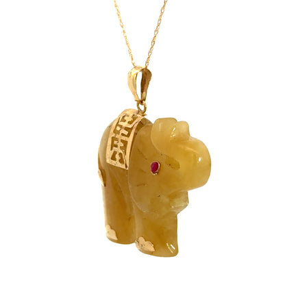 14K Yellow Gold Carved Yellow Jade Elephant Pendant with Ruby Accent