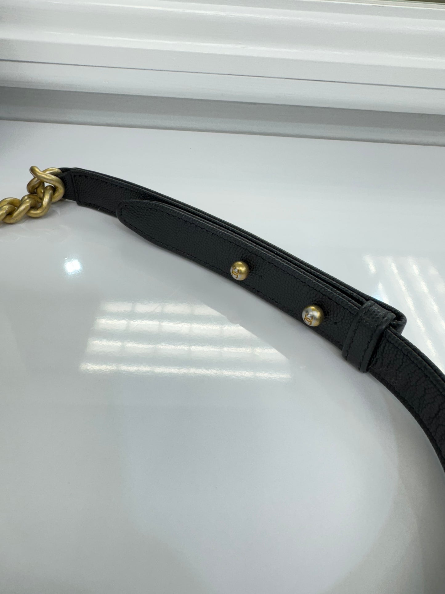 Authentic Chanel Boy Bag in Black Caviar Leather with Aged Gold Hardware