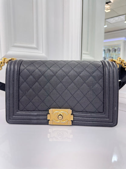 Authentic Chanel Boy Bag in Black Caviar Leather with Aged Gold Hardware