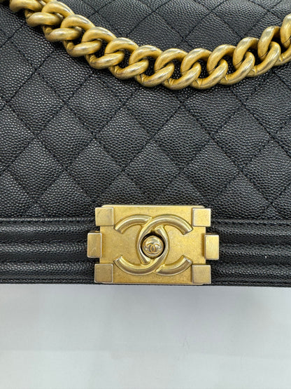 Authentic Chanel Boy Bag in Black Caviar Leather with Aged Gold Hardware