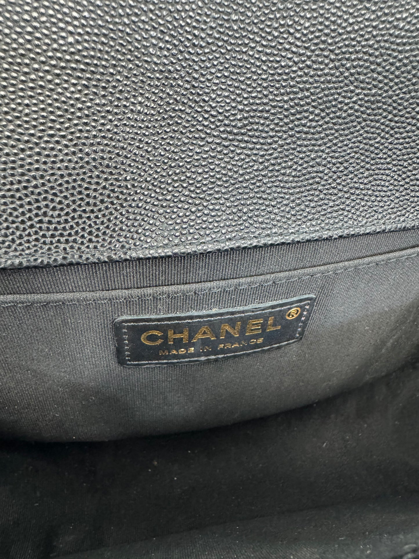 Authentic Chanel Boy Bag in Black Caviar Leather with Aged Gold Hardware