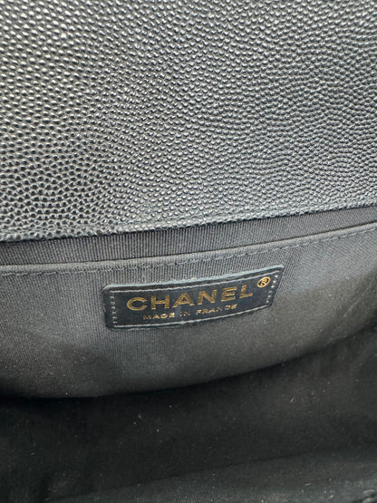 Authentic Chanel Boy Bag in Black Caviar Leather with Aged Gold Hardware