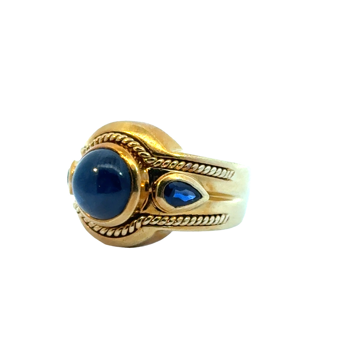 Vintage 1980’s Sapphire Ring in 18K Gold, Cabochon Center, Pear-Cut Accents