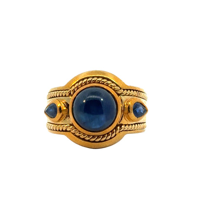 Vintage 1980’s Sapphire Ring in 18K Gold, Cabochon Center, Pear-Cut Accents