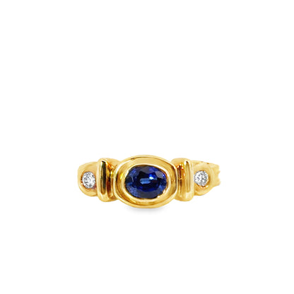 18K Gold Bezel-Set Sapphire Ring with Diamond Accents