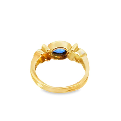 18K Gold Bezel-Set Sapphire Ring with Diamond Accents