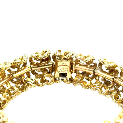 Luxurious Mid-Century 18K Gold Bracelet with White-Gold Diamond Ribbon Accents