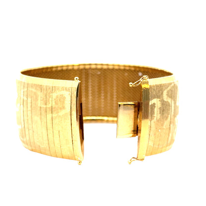 Wide 18K Yellow Gold Bracelet with Engraved Scroll Design