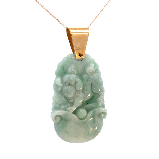 Elegant 14K Gold Pendant with Carved Green Jade