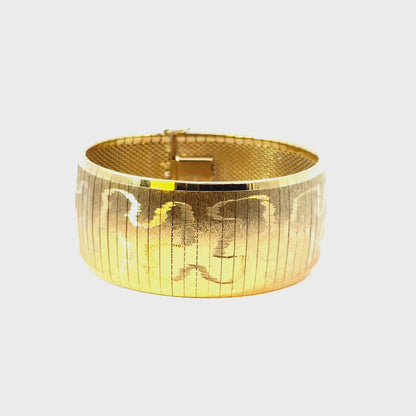 Wide 18K Yellow Gold Bracelet with Engraved Scroll Design